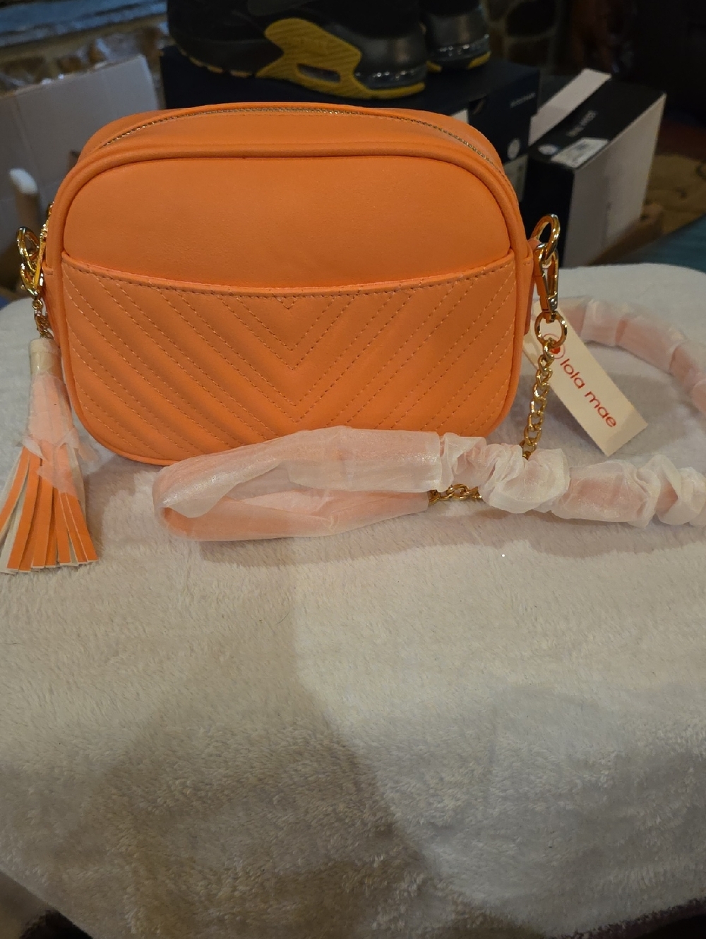 Lola Maye Peach Quilted Crossbody Bag